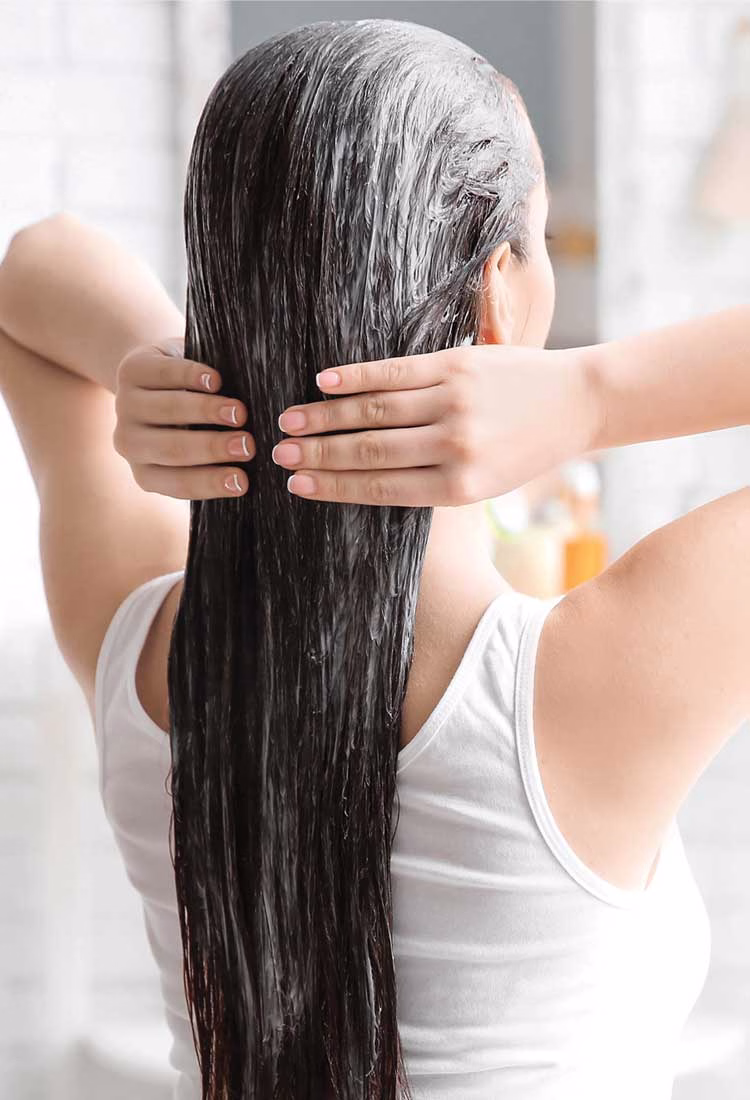 the hair playbook woman washing hair